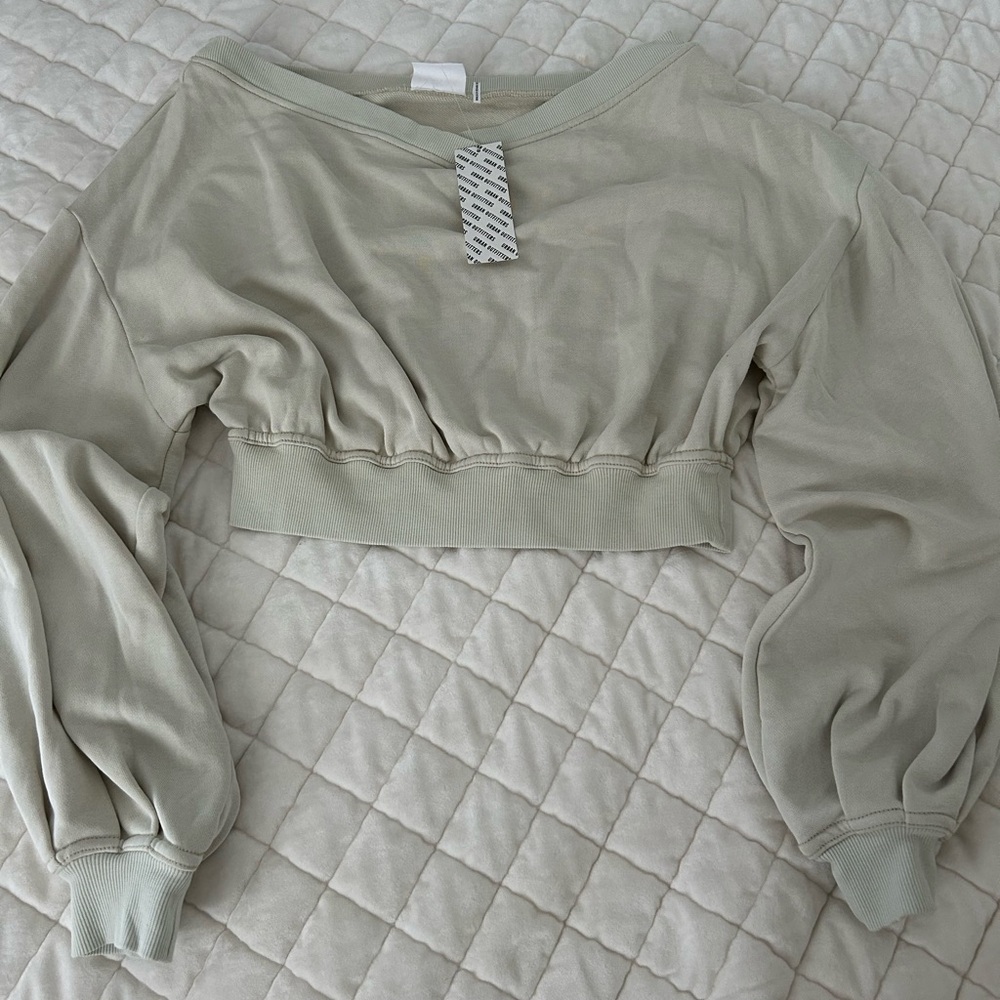 Urban Outfitters cream colored off the shoulder sweatshirt